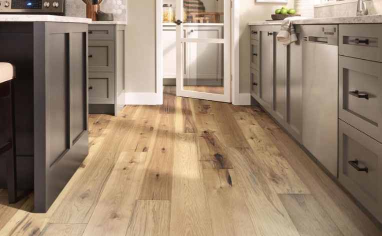 hickory hardwood in modern kitchen with door to butlers pantry